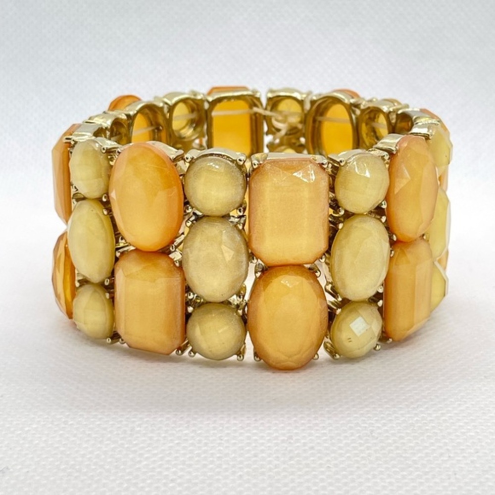 Beautiful, shimmery gold & pink stretch bracelet. Perfect for spring & summer!